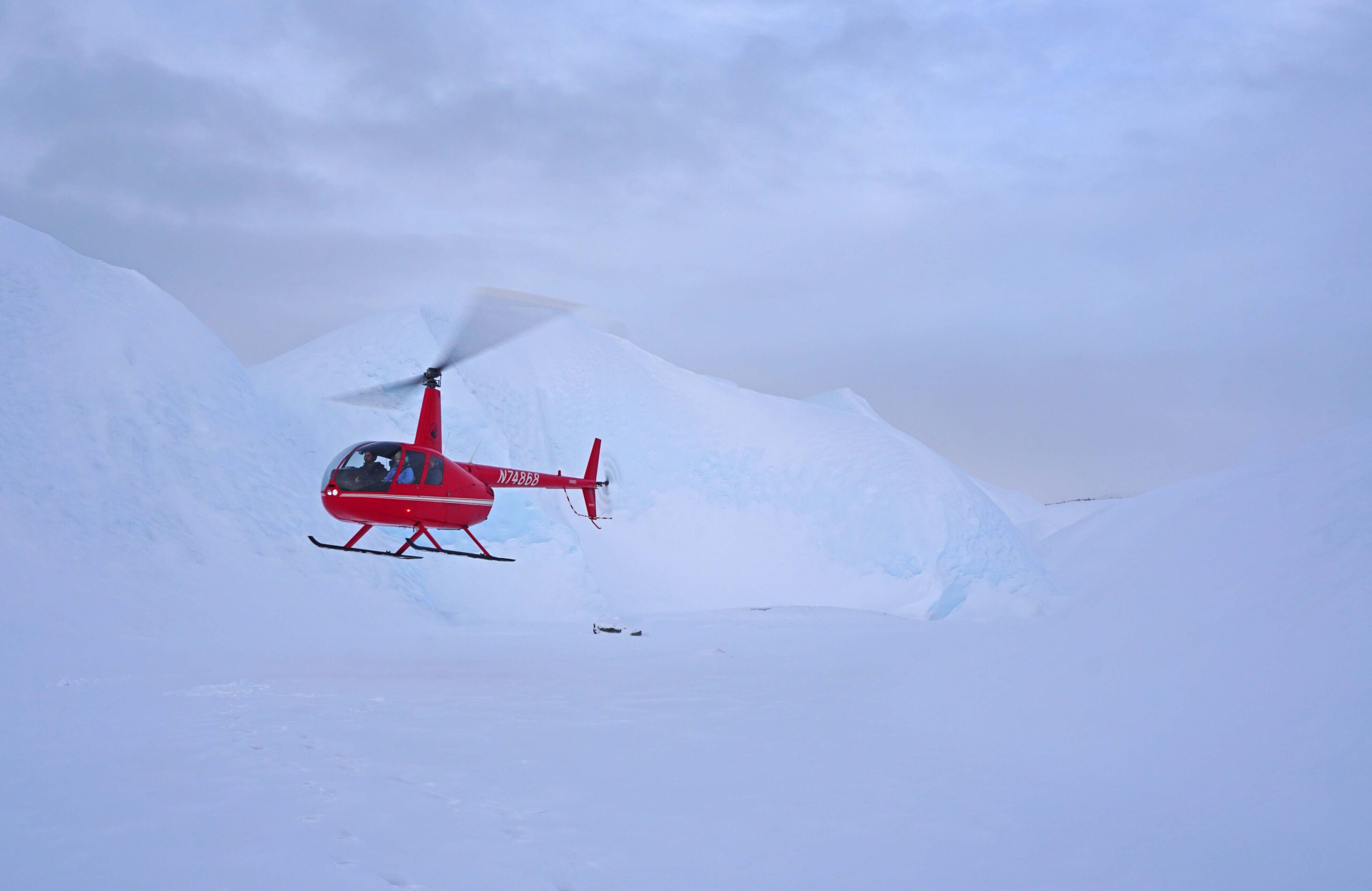 Helicopter landing on Matanuska Glacier