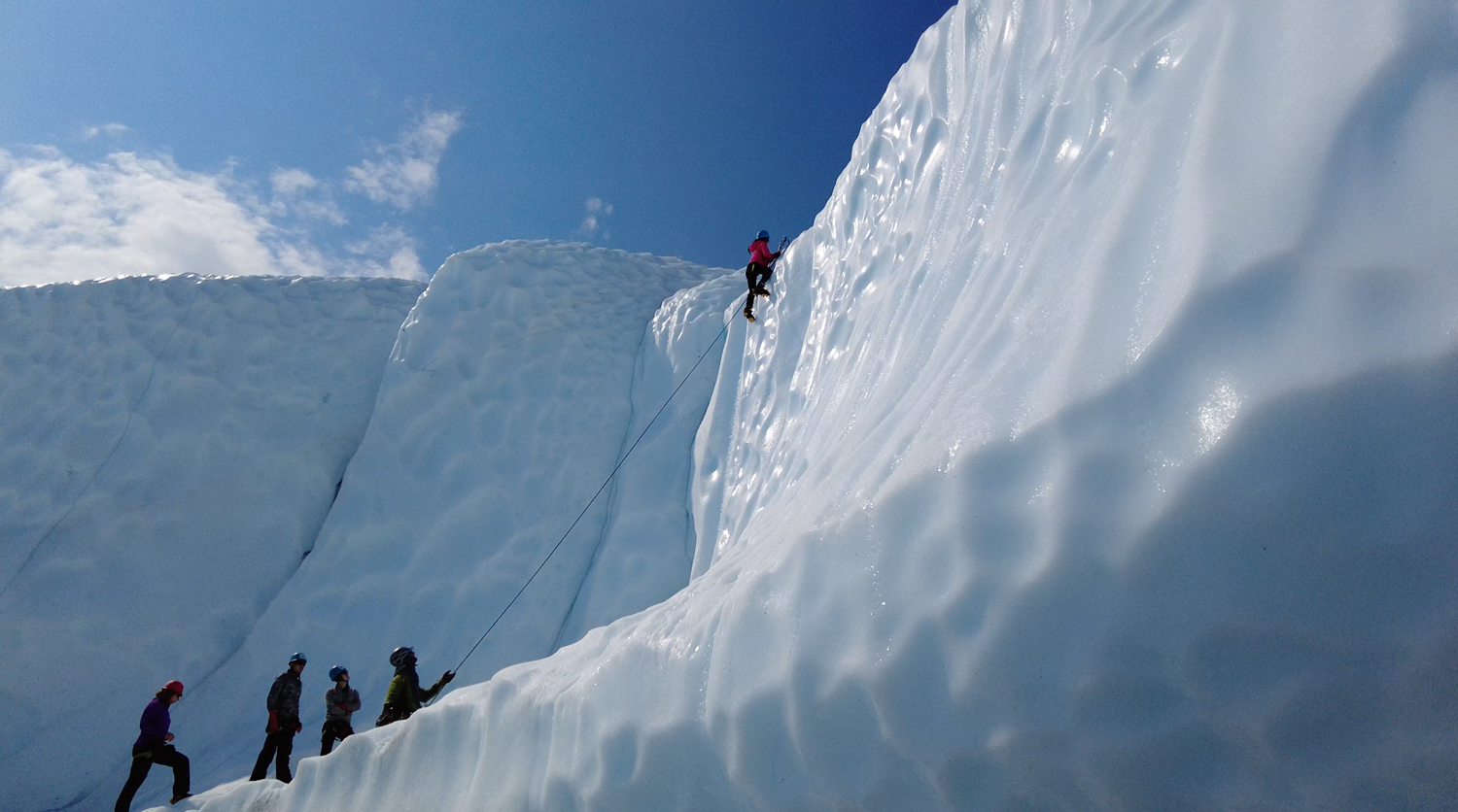 Gathering around the ice climber on Matanuska Glacier