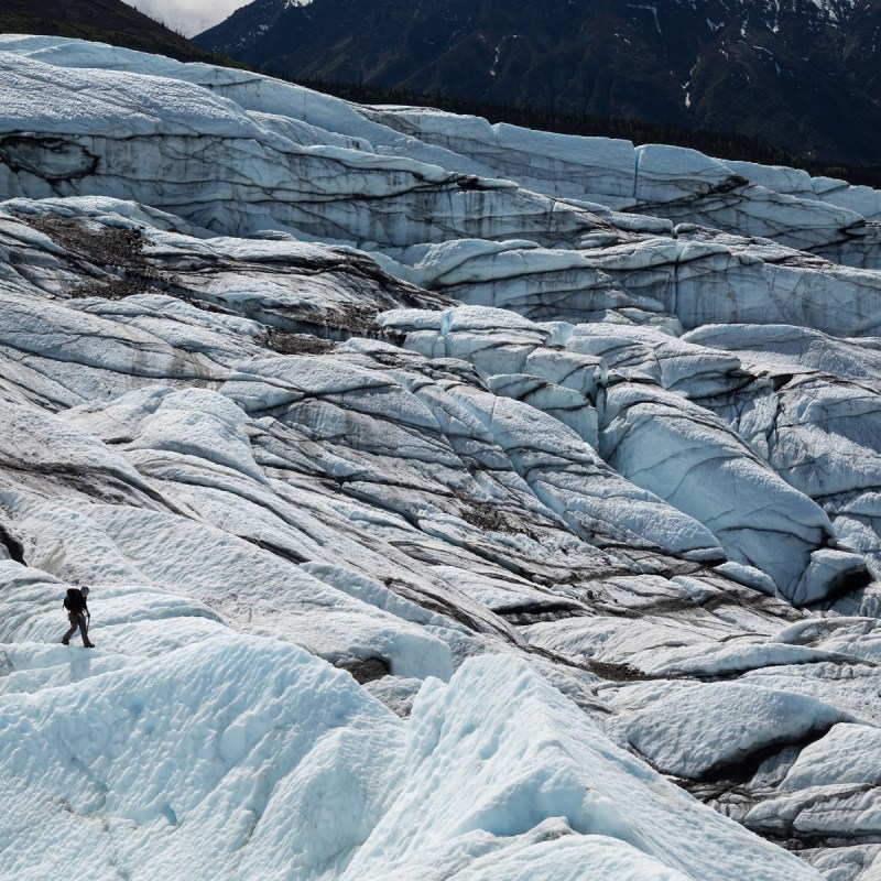 Person walking on glacier