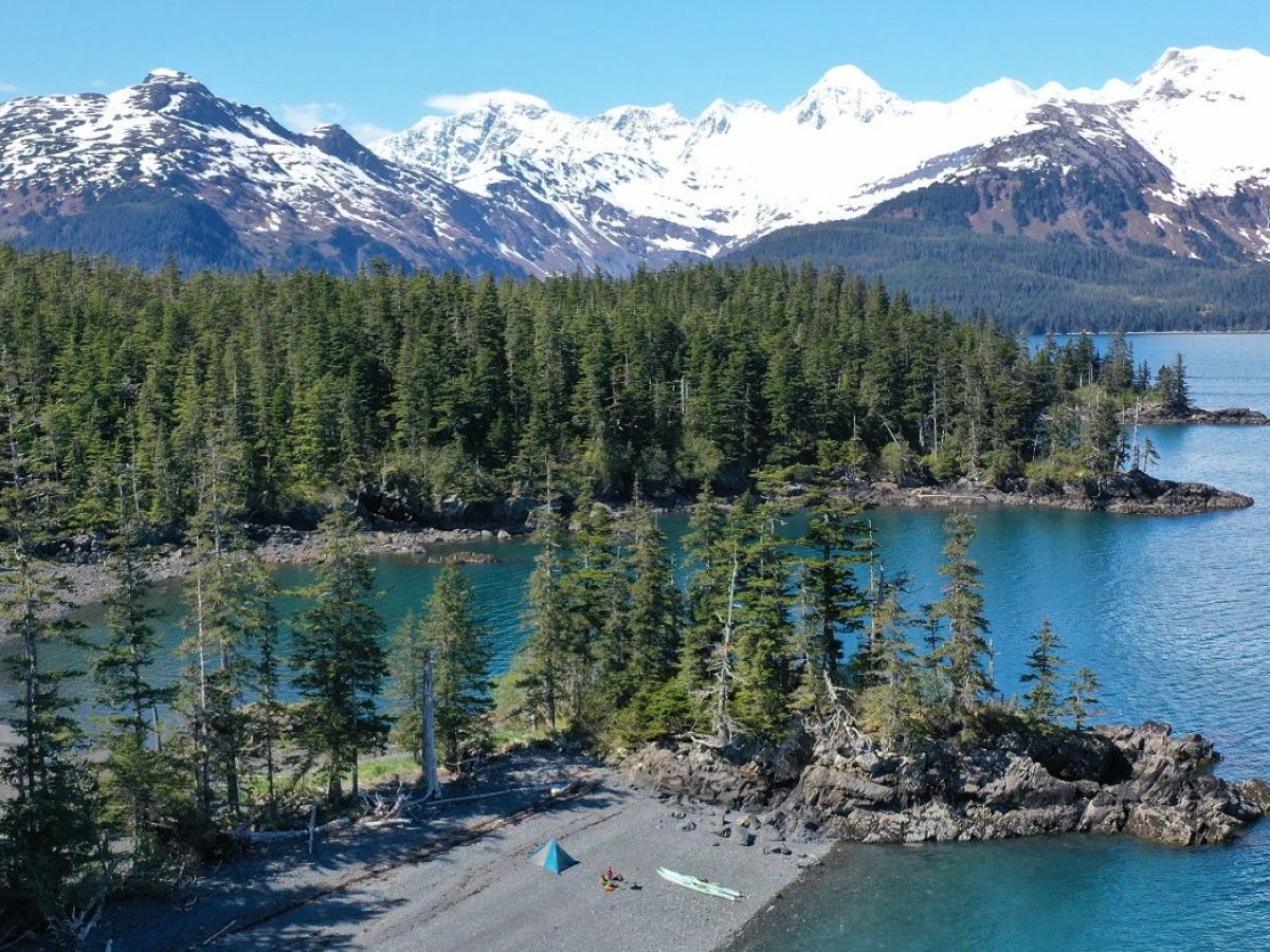 a lake with a mountain in the background