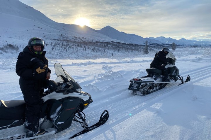 Riding a Snowmobile through Alaska