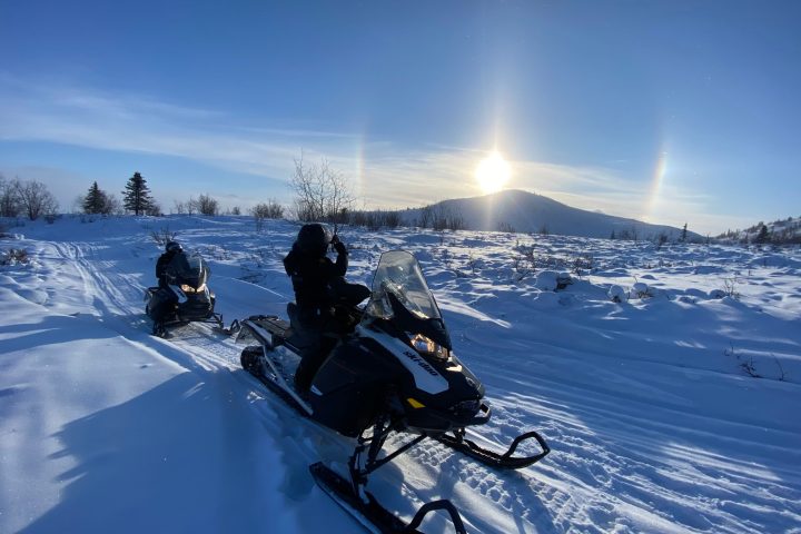 Alaska Snowmobiling at Sunset