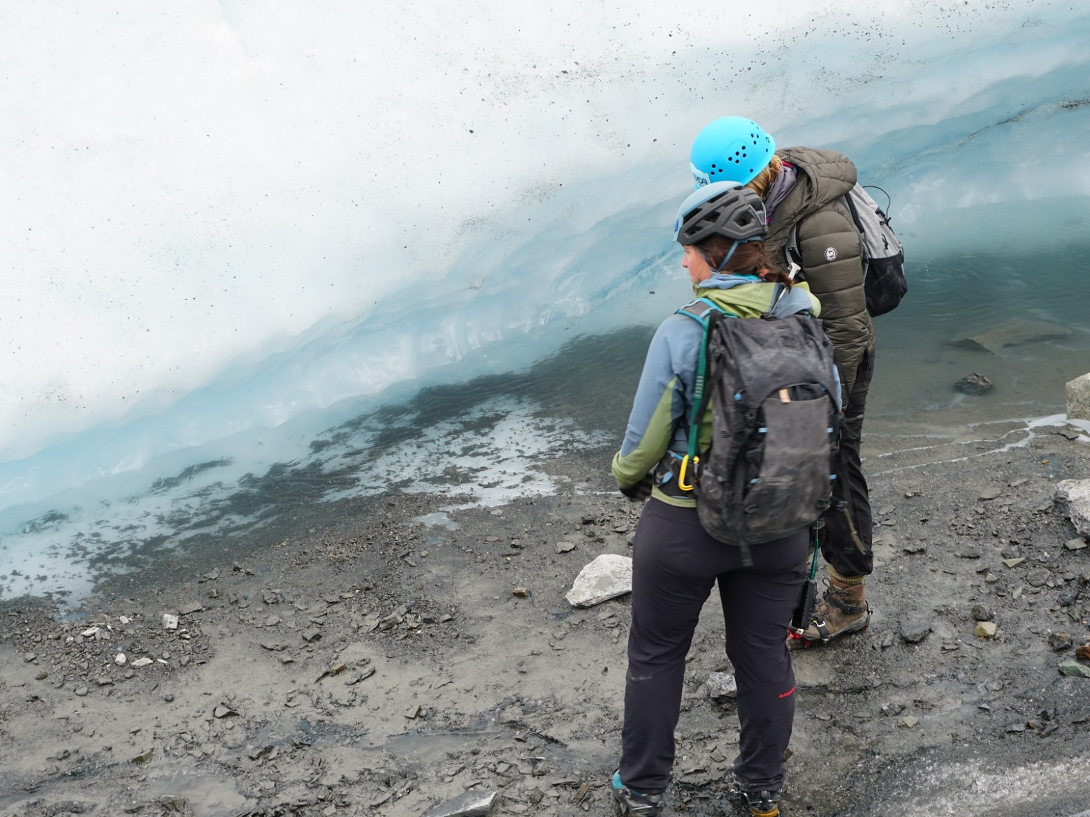 a man that is standing in the sand