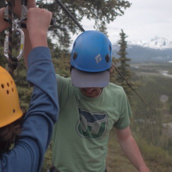 a little boy wearing a helmet