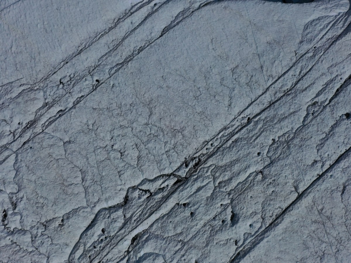 crevasses on glacier from aerial view