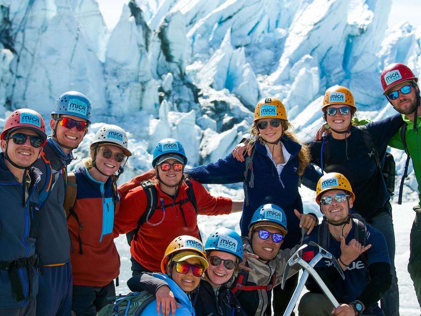 a group of people that are standing in the snow