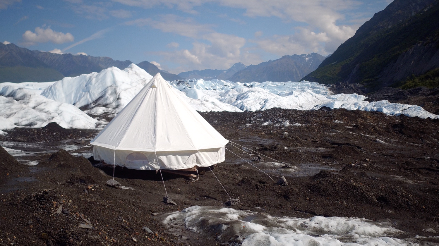 BCGlacierCampSiteLUXSolo a tent in the snow with a mountain in the background