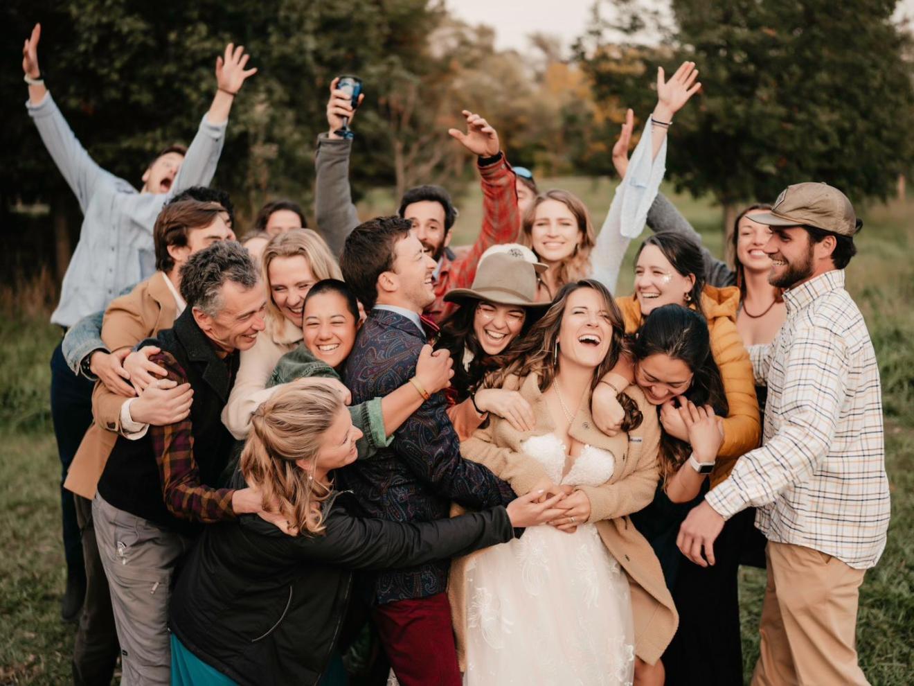 a group of people standing in front of a crowd